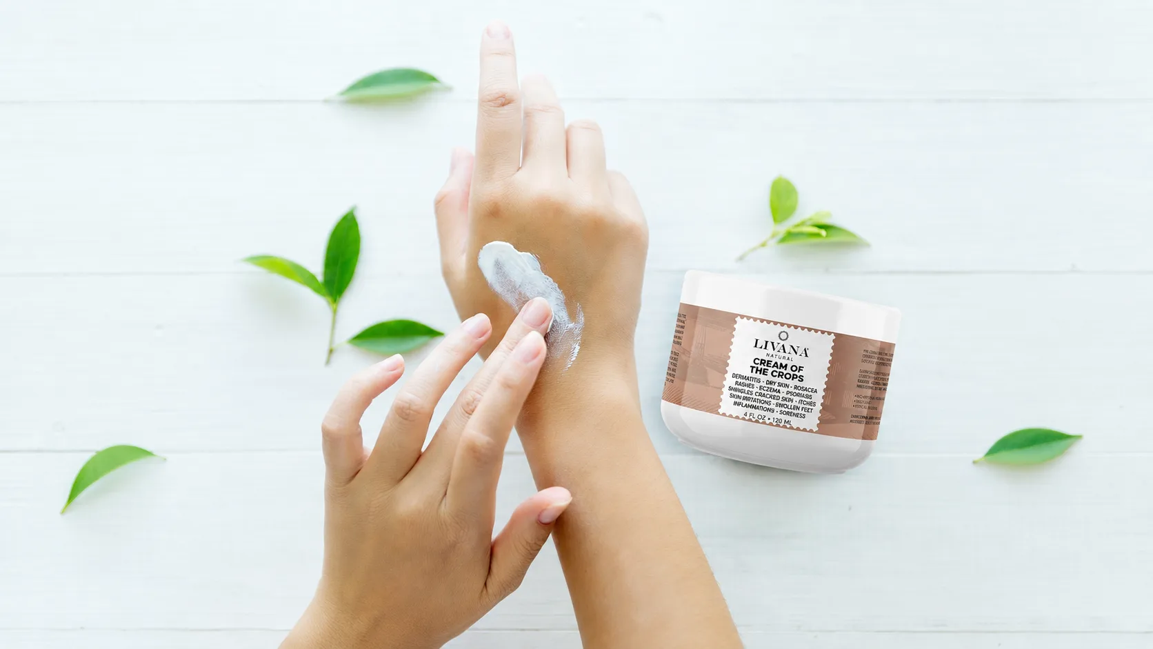 Livana Natural skincare product with hands applying cream